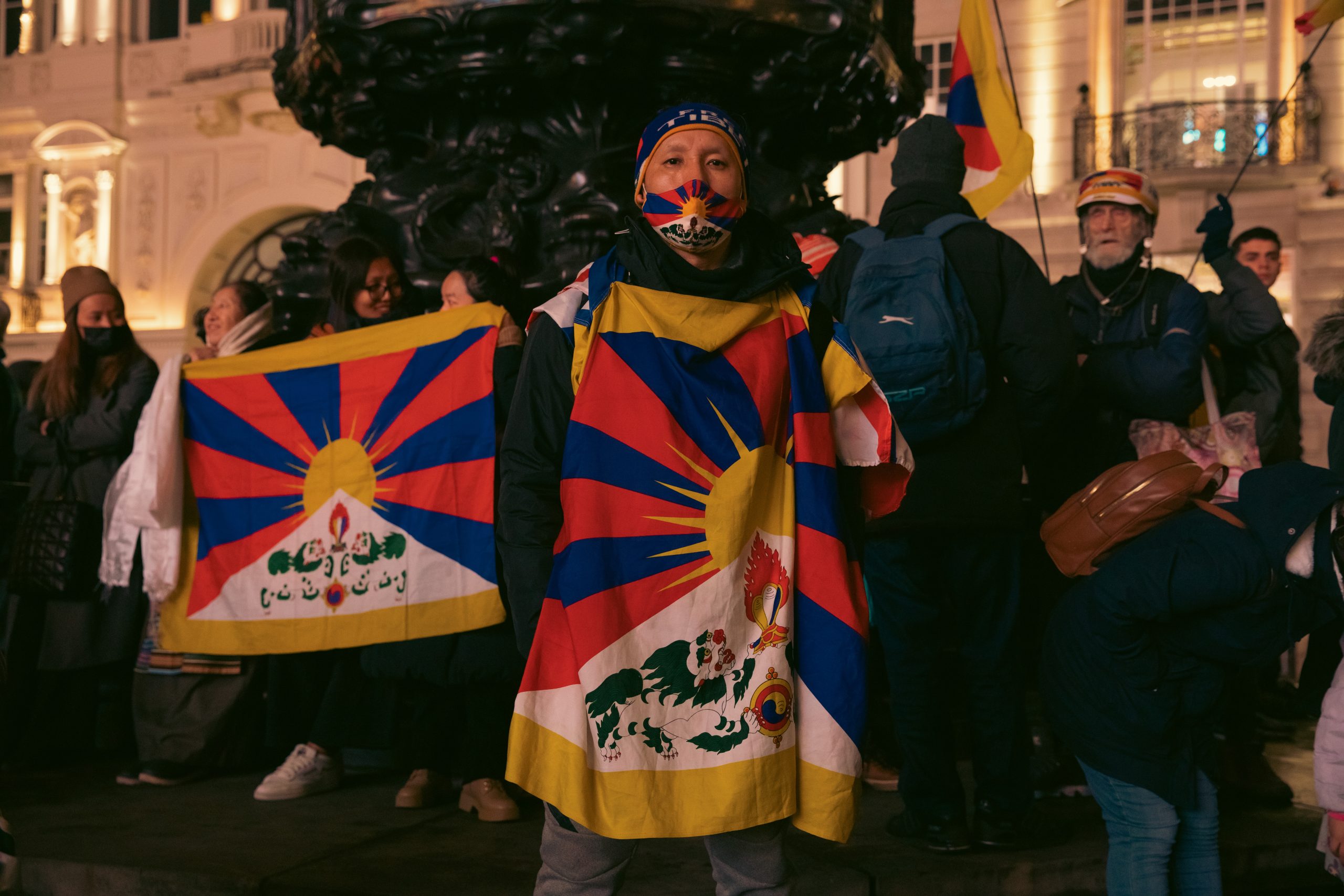 A member of the Tibetan community attending the Dalai Lama launch in London's Piccadilly Circus. January, CIRCA 20:23